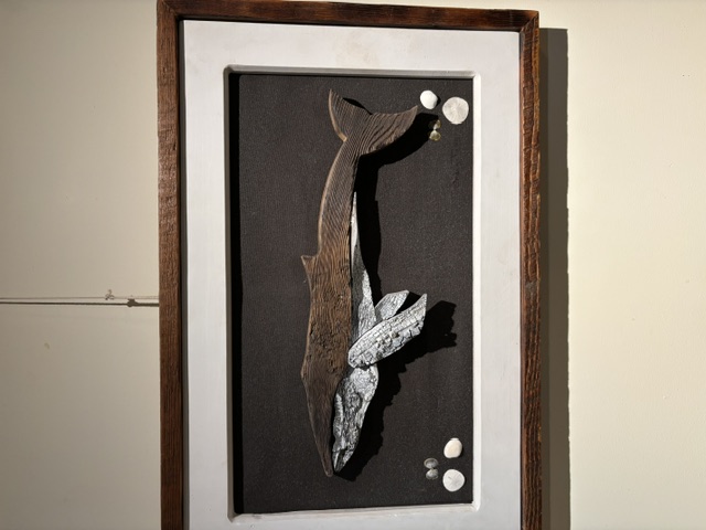 Framed humpback driftwood sculpture