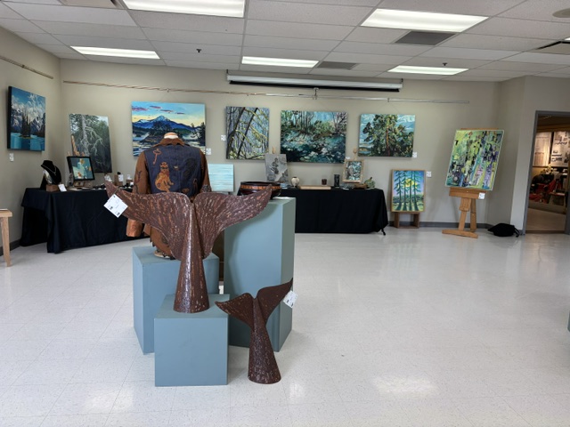 Whale tail sculptures in gallery